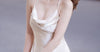 Woman in silk slip dress posing confidently on city street — silk lace slip dress 2026 trend Nocturne Calliope Studio Australia